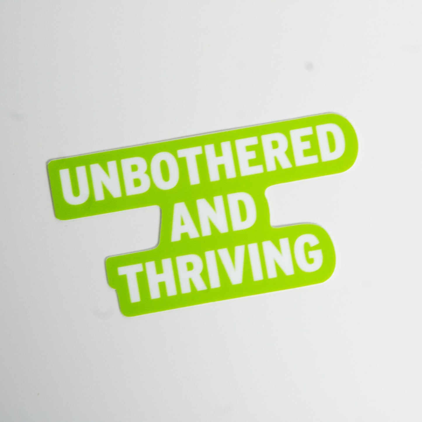 Unbothered and Thriving Sticker